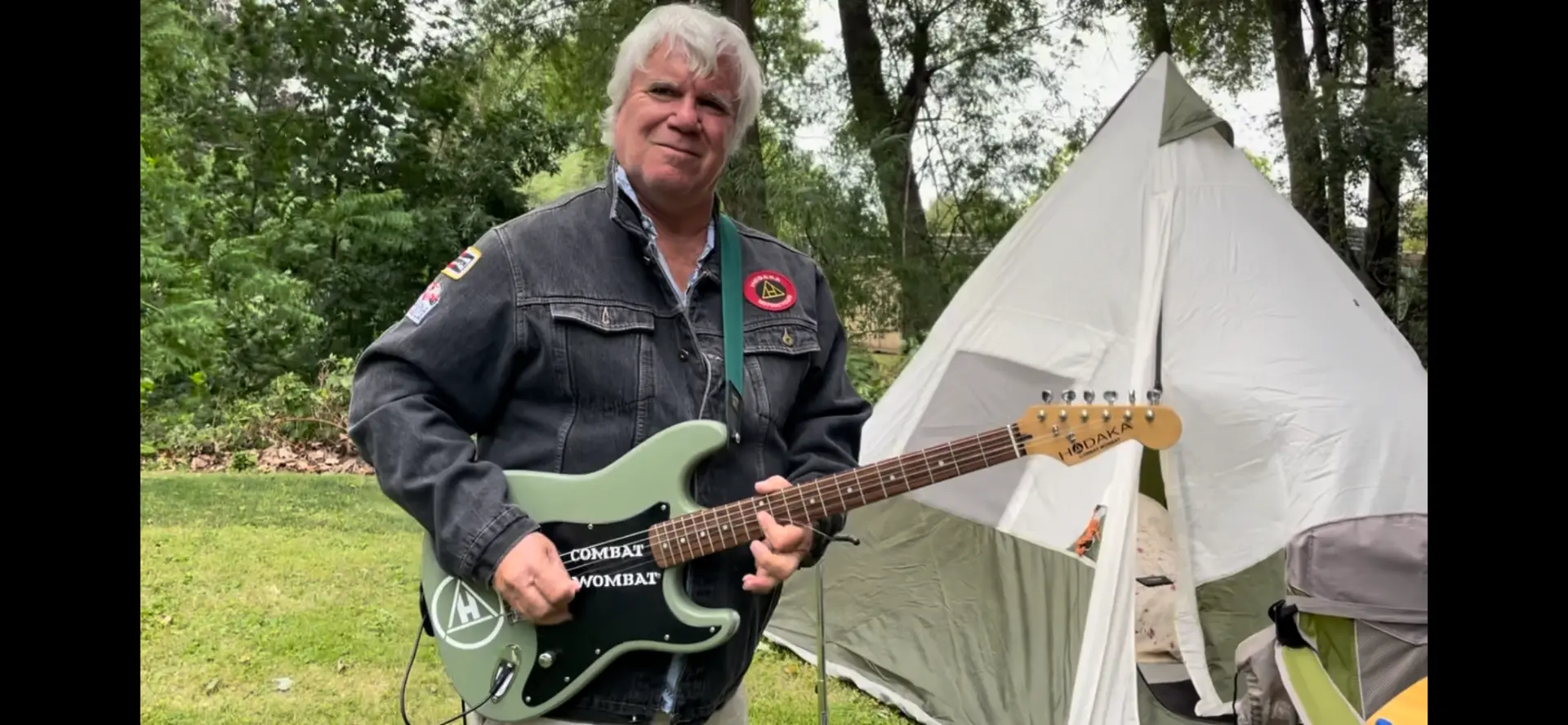 Greg Hall playing lead guitar